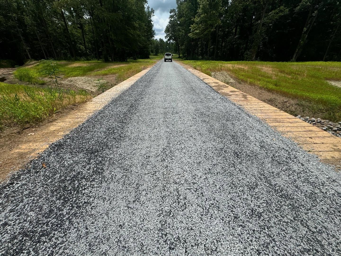 Gravel road through a wooded Mississippi property
